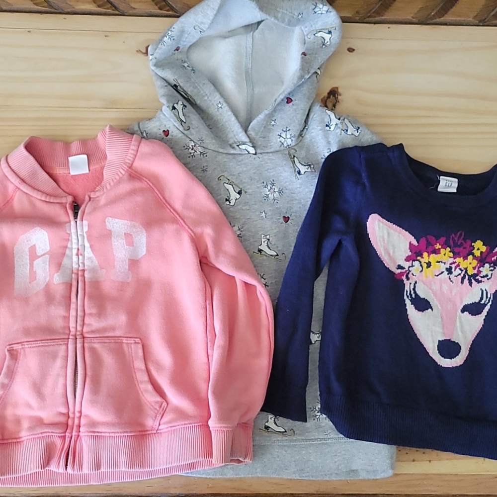 Three baby gap sweaters size 4